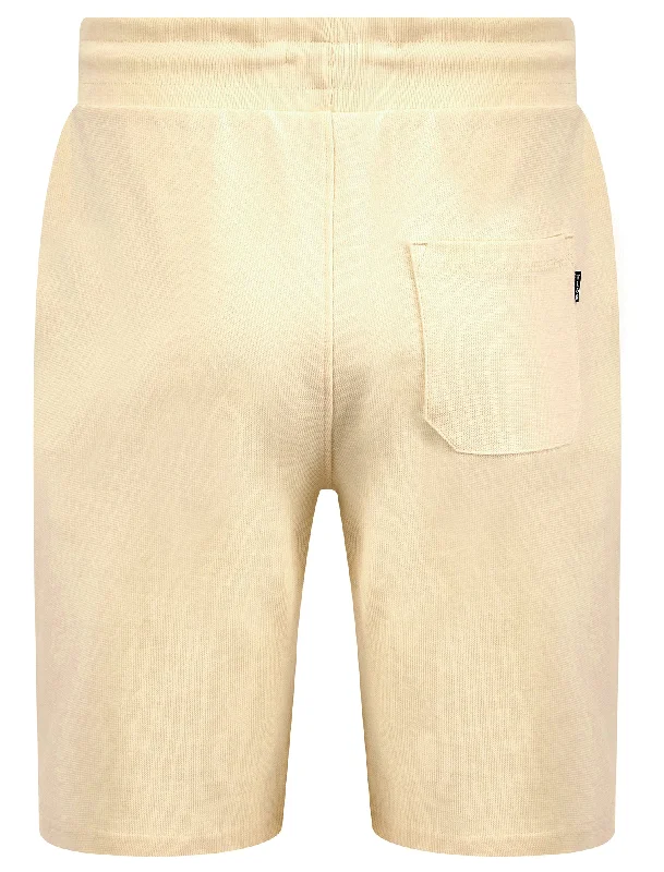 Tarot Motif Brushback Fleece Jogger Shorts in Pristine Cream - Tokyo Laundry